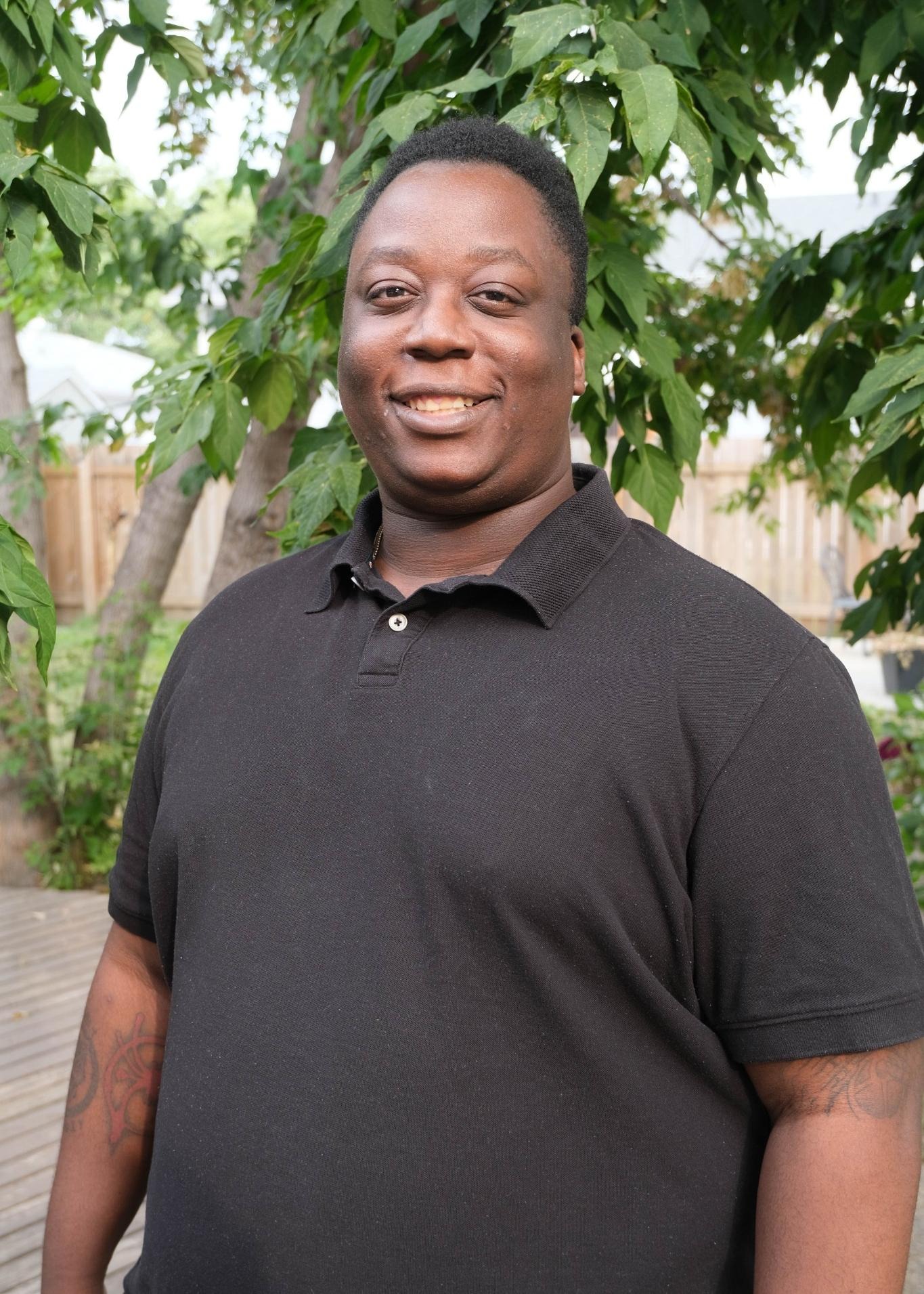 Portrait of voice actor Sempa Mpagi